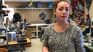 EcoEquitable staff makes purses and bags with flags used in events.