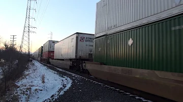 NS 202 With An EMD SD70M-2 At Sunset At Bound Brook With NJ Transit Leaving