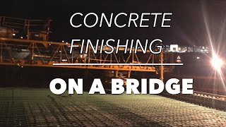 Concrete Finishing on a bridge at night with a BID-WELL