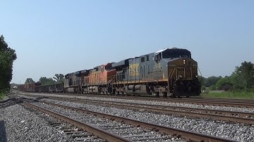 CSX ES40DC 5435 w/ BNSF Power Leads Manifest M582-11 on 6/15/22