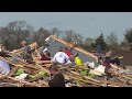 Residents begin going through the rubble after tornadoes hammer parts of Nebraska and Iowa