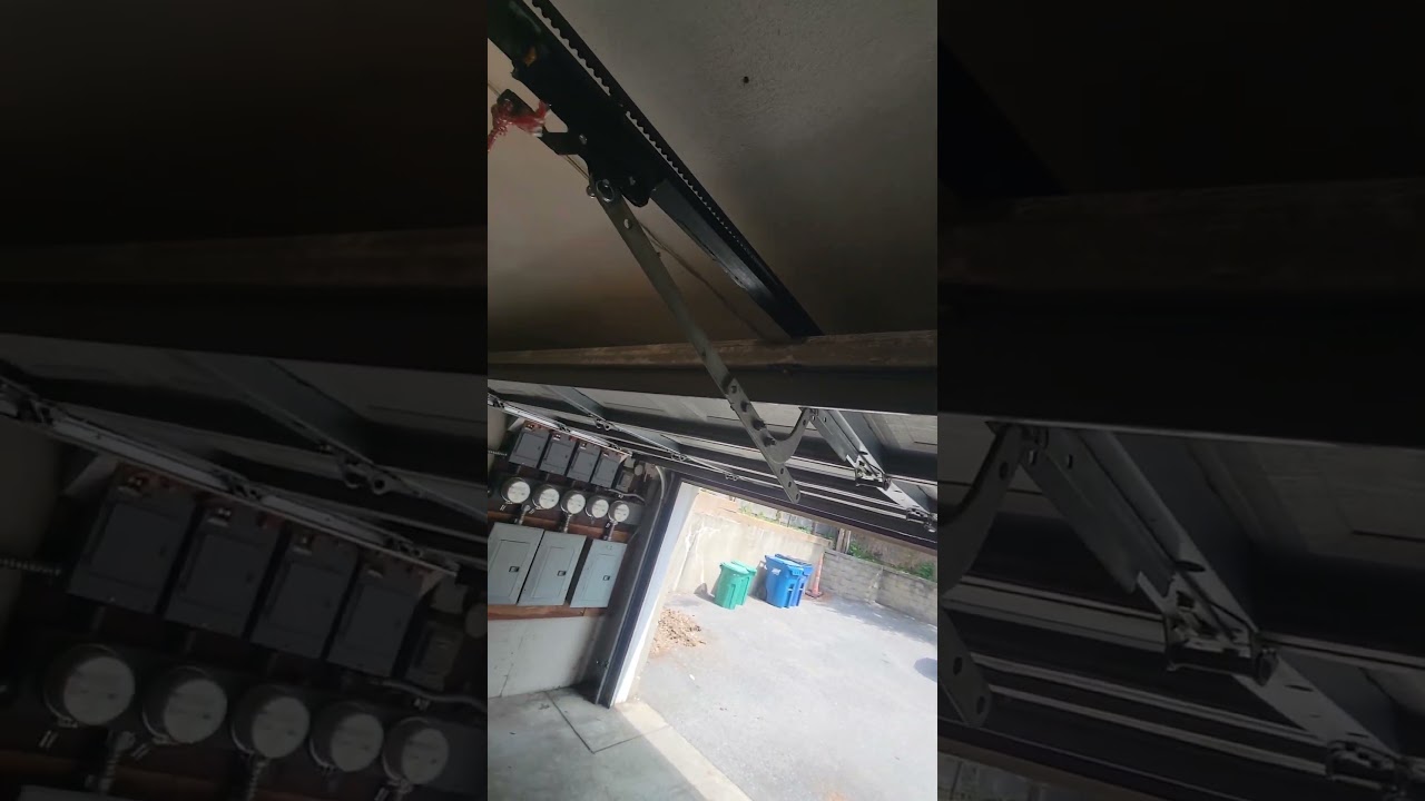 Folding in half, a simple repair. #doors #garage #repair #fix #diy #simple #breaking #shorts #watch