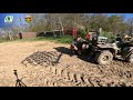 Drag harrow leveling rough soil  landtop  grazing acres farm