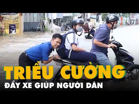 Video Triều cường bủa vây, nhiều đội nhóm đẩy xe, sửa xe... - youtube