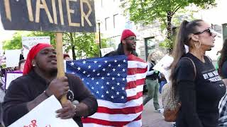 Protesters march in Grand Rapids after a mistrial in the Christopher Schurr murder trial