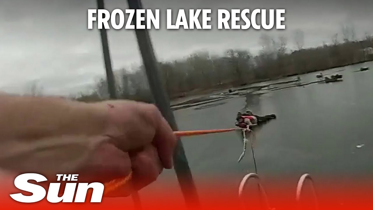 Police officer CRAWLS across frozen lake to rescue fishermen and dog ...