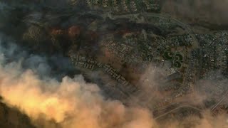 Famous LA area's 2 biggest blazes burn at least 10,000 structures, while new fire leads to more evacuations Profile
