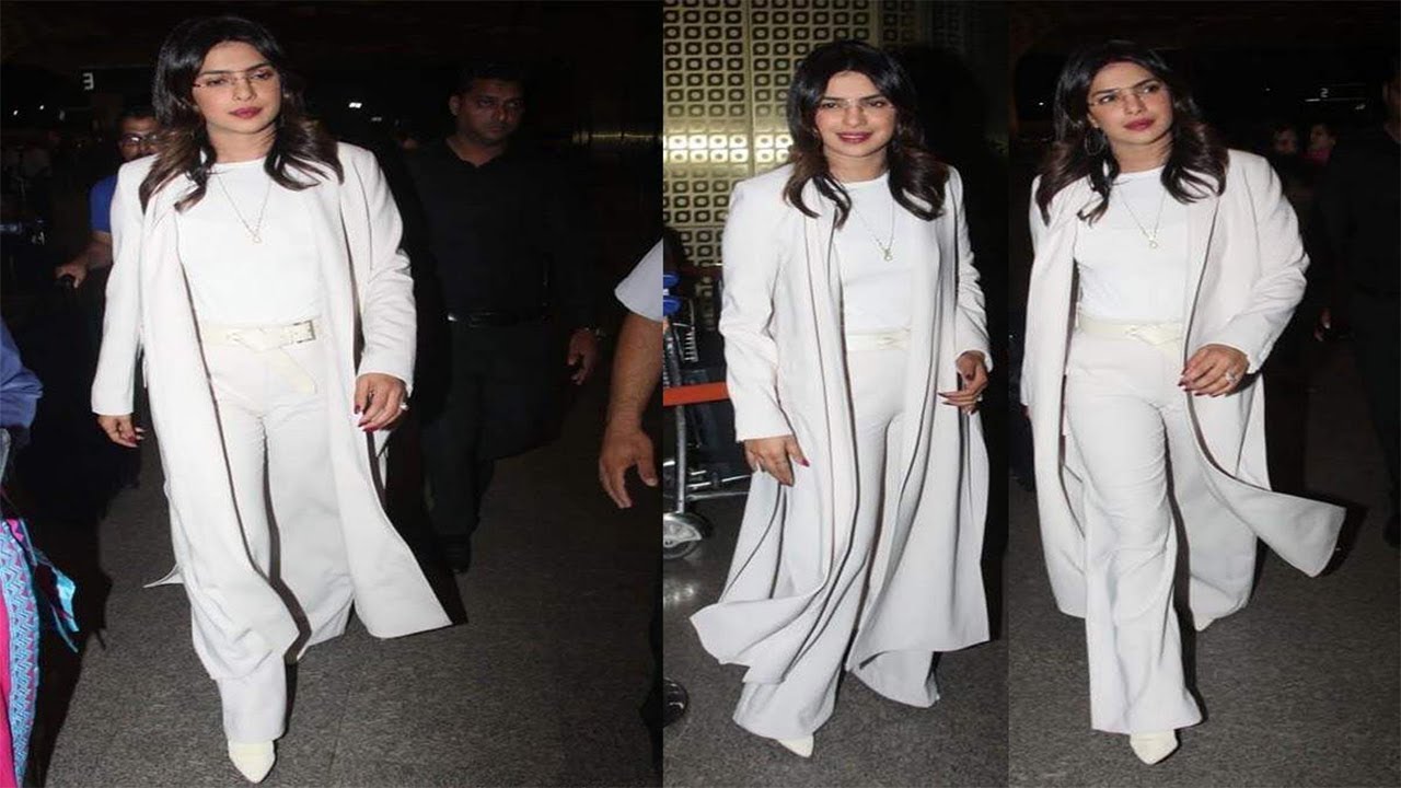hitlab media Super-hot Priyanka Chopra makes a super stylish appearance in all-white attire at the Mumbai airport