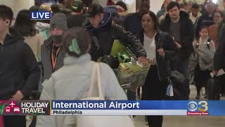 Long lines forming at Philadelphia International Airport as travelers hope to beat winter storm