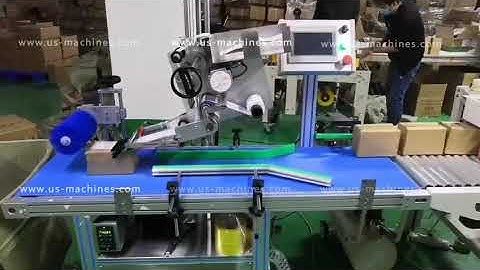 Automatic small carton box pushing down top flat suface labeling machine running video