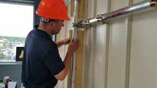 How to attach a door to the Greenloc Hoarding system