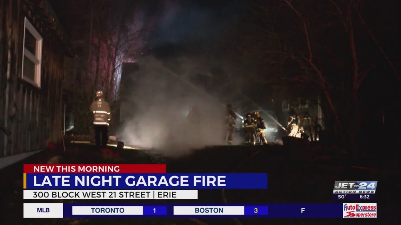 Crews battle overnight garage fire along West 21st Street - YouTube
