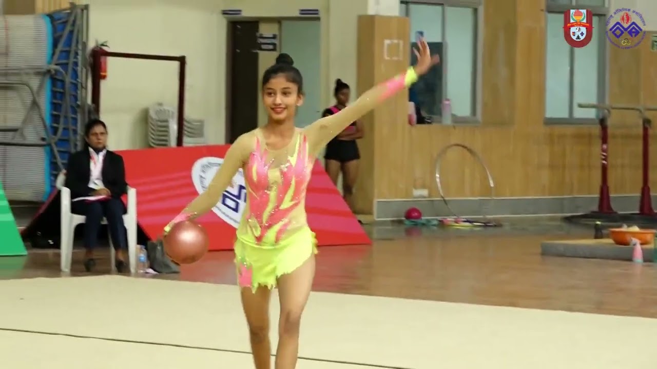 Rhythmic gymnast in action in the Maharashtra State Olympic Games 2023.