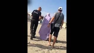 منع محجبة من لبس الحجاب أو البوركيني على الشاطئ وهم عراة اين الحرية