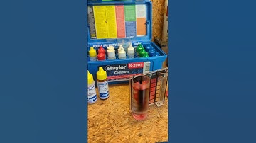 Testing the chlorine and pH in a swimming pool