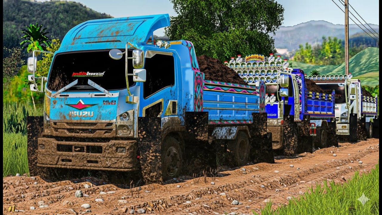 Команда шестиколесных грузовиков перевозит грунт с места рытья пруда посреди рисового поля, чтобы...