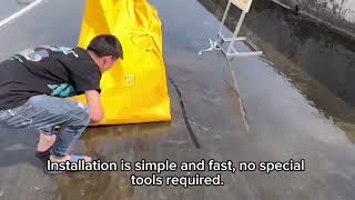 Inflatable flood barrier test – fast deployment, effective water protection.