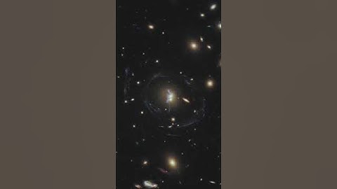Violent Galactic Merger and Chain of Star Formation - Hubble Space Telescope #shorts