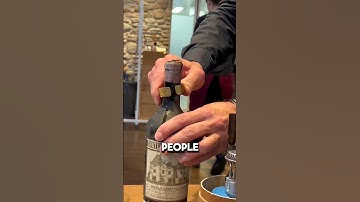 Why Old Wine Bottles Are Opened by Breaking the Neck