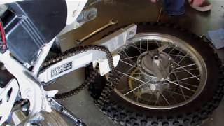 Motorcycle rear wheel removal Honda CRF 230F