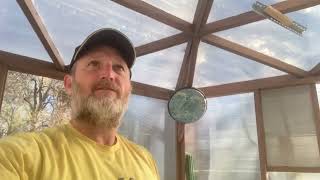 Pentagon shaped greenhouse with polycarbonate exterior. Doing well after 5 yrs. 120 square feet.