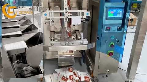 Automatic 4 head electronic scale packaging machine for packing washing powder.