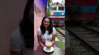 Cheerful Lady's Reaction to Train Arriving on Train Street in Hanoi