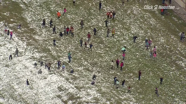 Students play in snow at Houston-area school Dec. 8, 2017