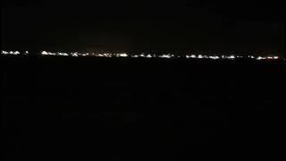 suasana malam di tepi pantai