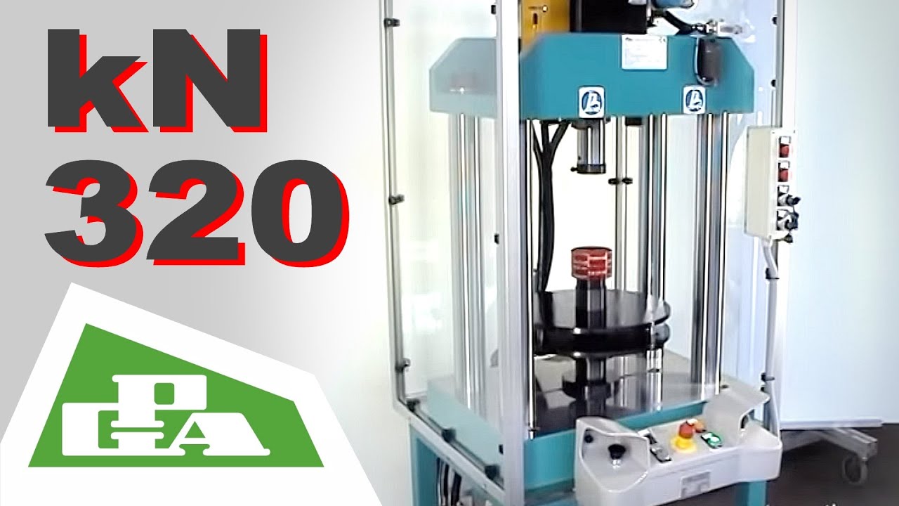 Pressa con moltiplicatore di pressione aria olio - Press with air oil pressure intensifier.