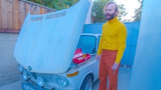 Man fixes car