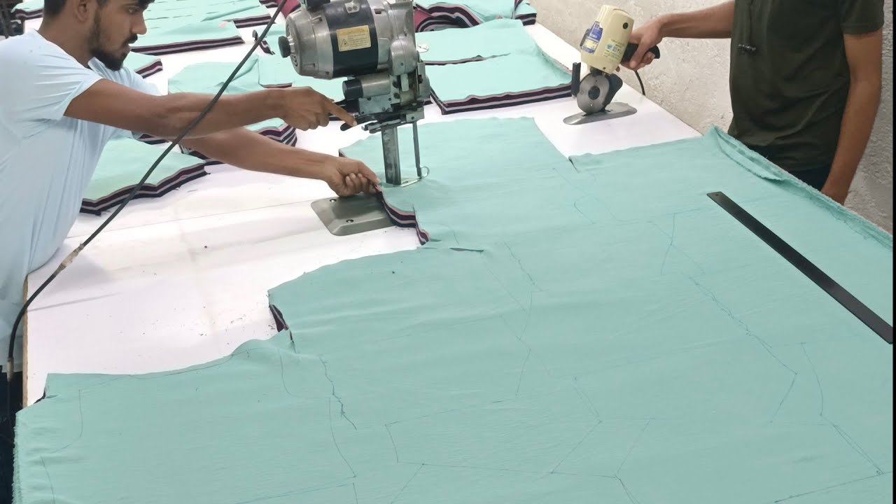 Fabric cutting with straight knife machine - YouTube