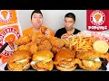 My Little Brother Tries Popeyes Spicy Chicken Sandwich For The First Time • MUKBANG