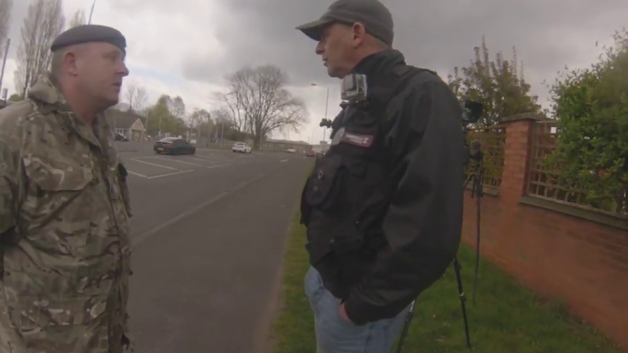 Army barracks security vs. photographers (apologies for the poor sound quality)