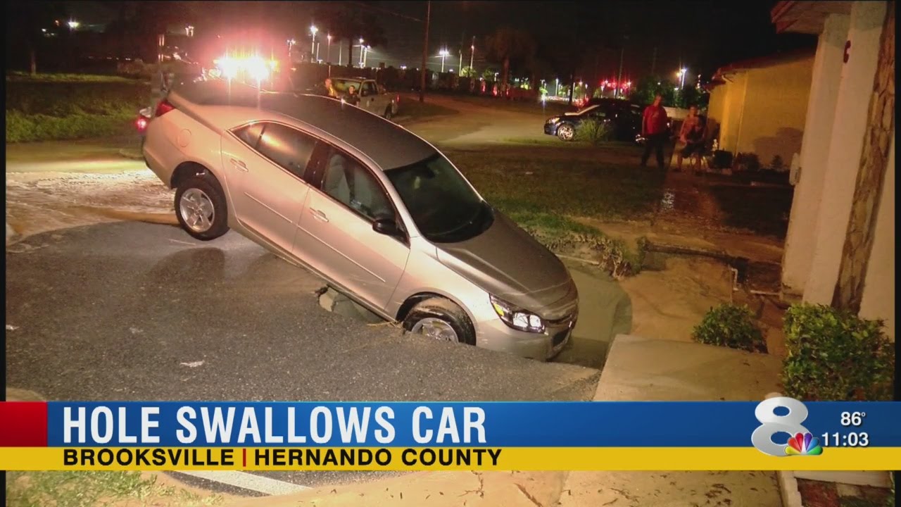Hole swallows car in Hernando Co.