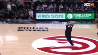 Hawks fan drills half-court shot for $10,000 | ESPN