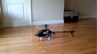 Trex 500 & my DX6i settings hovering in living room.