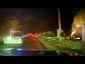 Dashcam video of police rescuing a man from a burning vehicle in Grand Island
