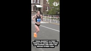 Runners cross the finish line of the 47th annual Independence Blue Cross Broad Street Run