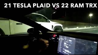 22 ram TRX vs 21 tesla plaid roll race