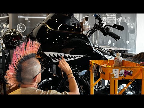 I painted shark teeth on my Harley Road Glide lol - it looks cool