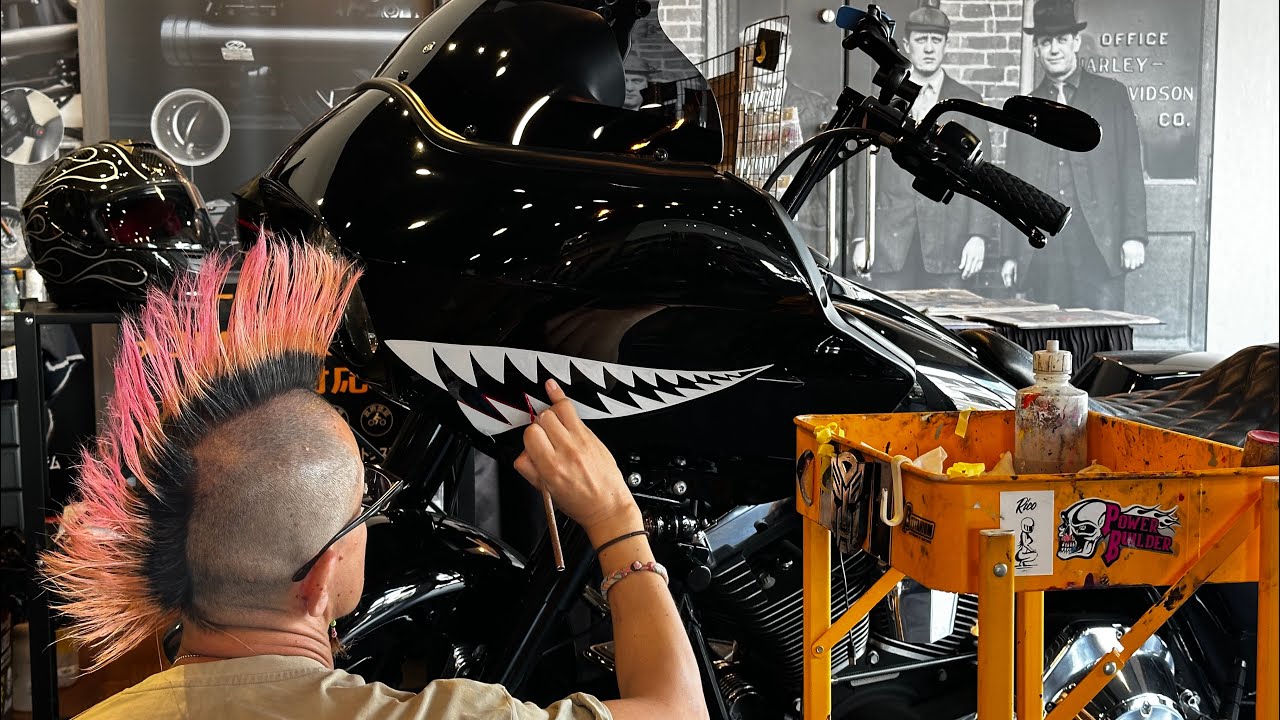 I painted shark teeth on my Harley Road Glide lol - it looks cool
