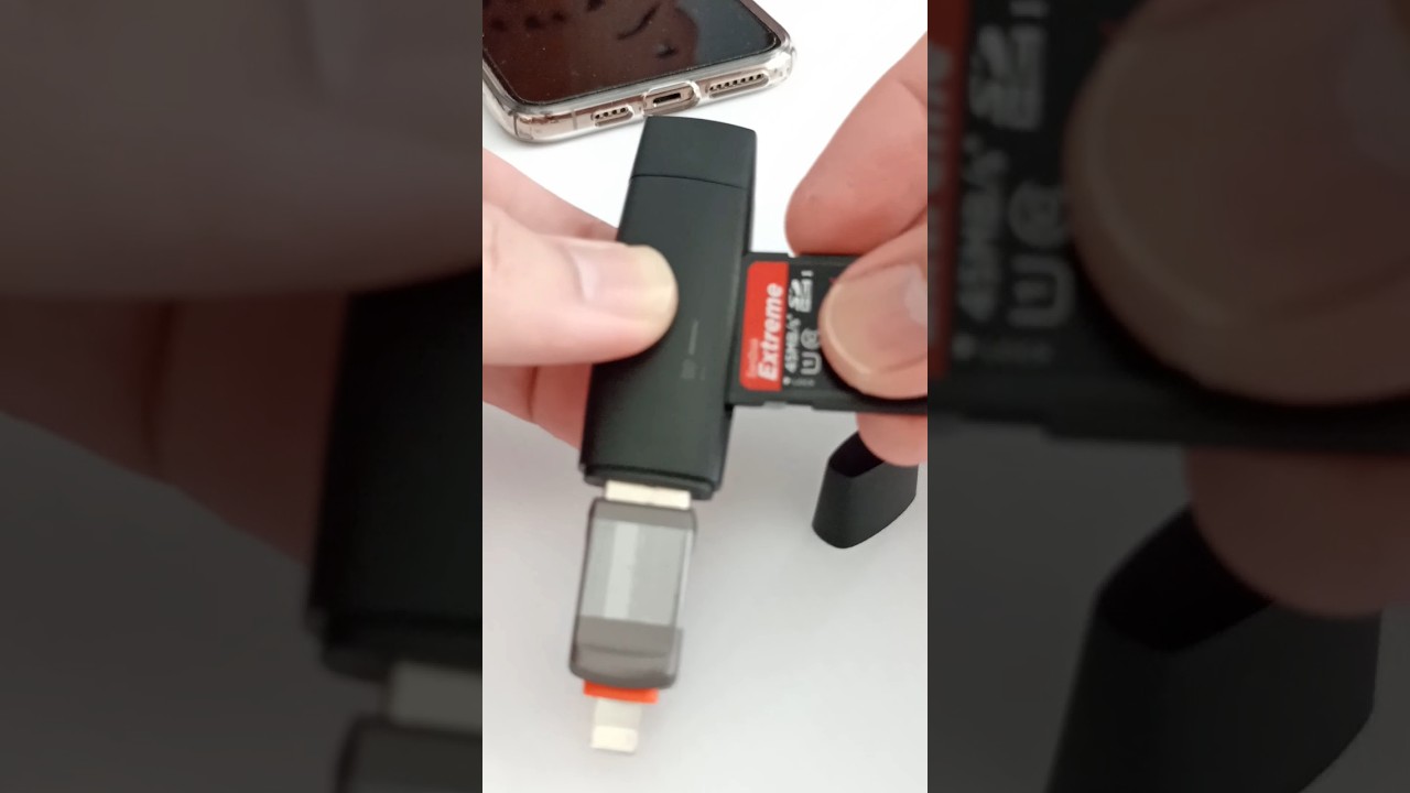 Plug the card reader into the Lightning adapter and then insert the SD Card into the reader 