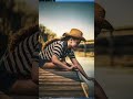 Stunning Dockside Photoshoot: Model Poses with Sunny Skies &amp; Water! #shorts