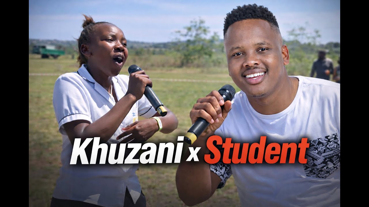 Khuzani Shares the Stage with a Student Performer(Hillgrove Secondary School)