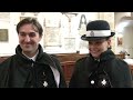 Commitment and compassion recognised in St John Service as two invested into Order