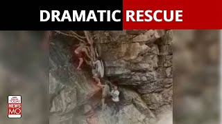 Salem: Dramatic Video Shows Woman, Child Rescued From Beside Raging Waterfall | NewsMo