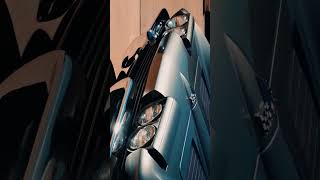 1963Chevrolet Corvette Sting Ray features iconic design,a split rear window,a powerful 327 V8 engine