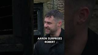 Aaron surprises Robert