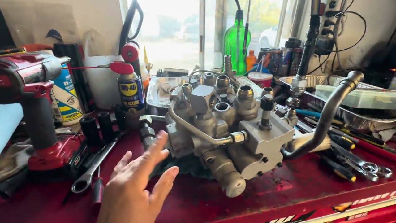 Bobcat T300 control valve cleaned and ready to be put back together. So many parts.